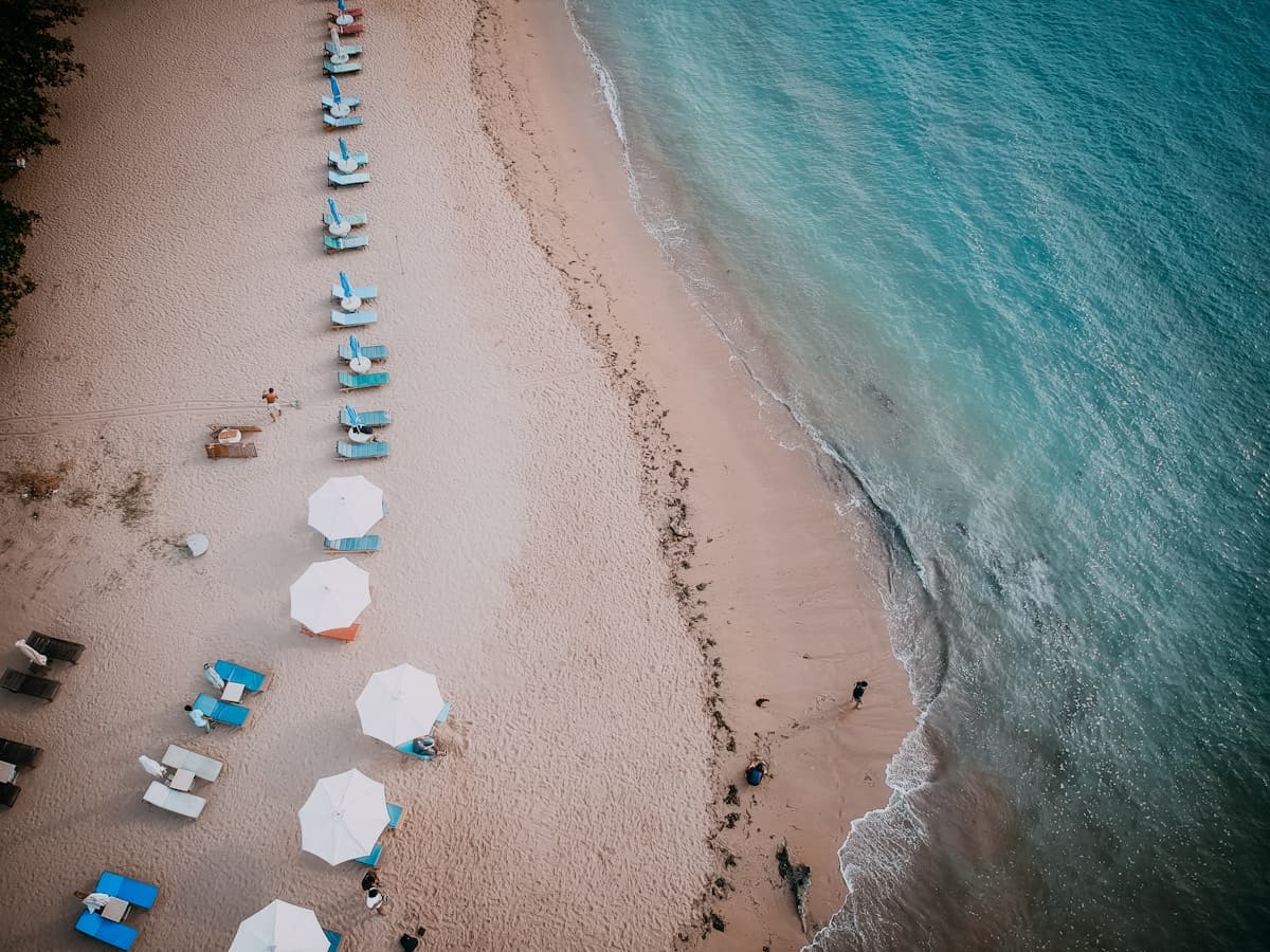 Bali Sanur — traditional jukung outrigger boats on the sunrise beach