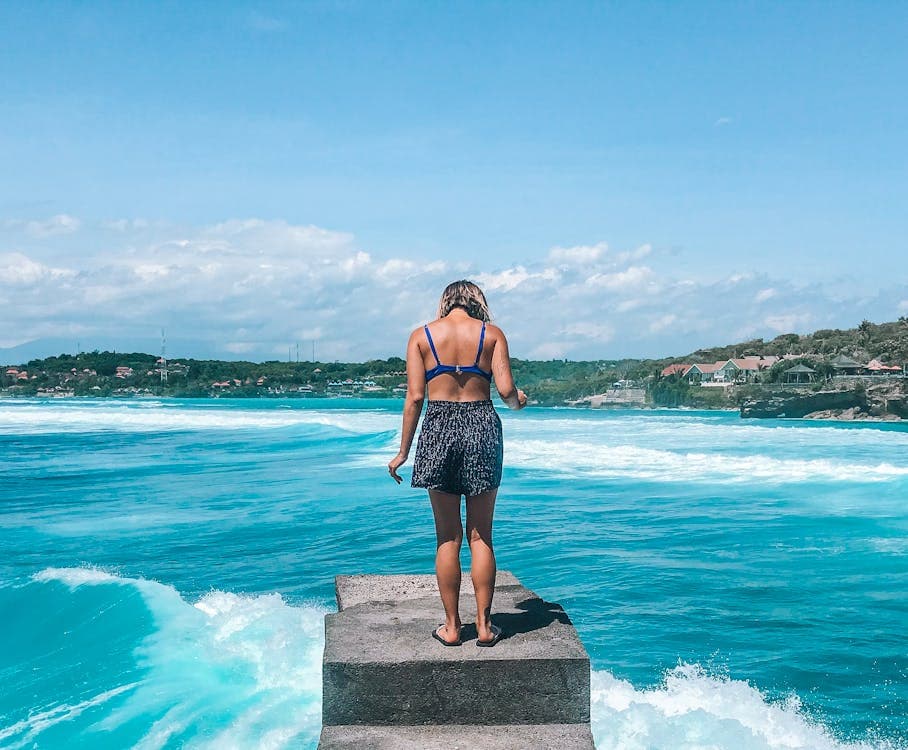 Bali — calm waters and dock at Lovina, north Bali coast