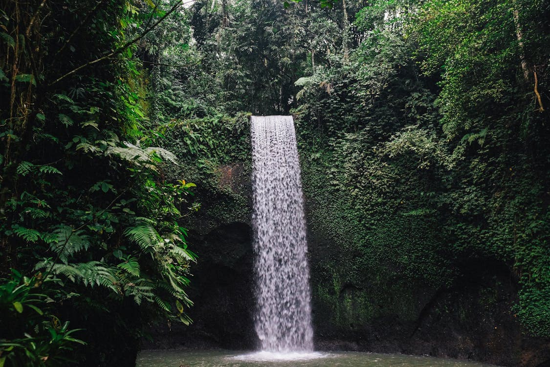 Bali — Tibumana twin waterfall hidden in jungle near Munduk highlands